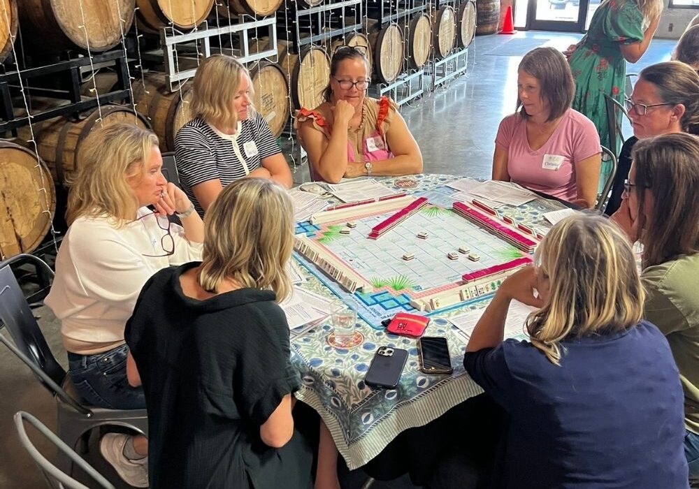 Local women learn
mahjong at a class
Colleen Loftus hosted
at Alter Brewing in
Downers Grove.